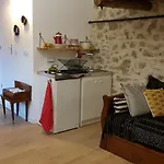 Little House With A Large Roof Garden In The City Center
